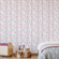 Quarto-infantil-decorado-com-papel-de-parede-flores-rosa-cerejeira